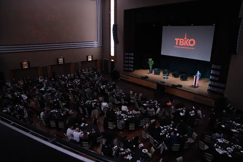 The full hall from the balcony, the TBKO mark on the screen